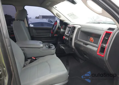 2015 Ram 1500 St z USA, uszkodzony, nr VIN 1C6RR6FG8FS591056